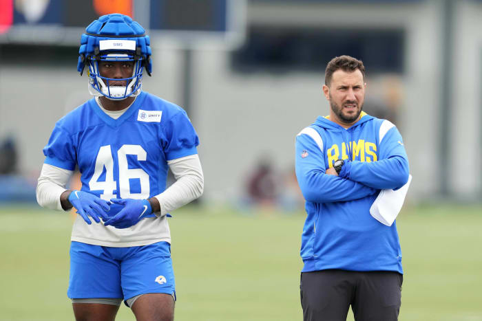 Jun 14, 2023; Thousand Oaks, CA, USA; Los Angeles Rams tight ends coach Nick Caley and tight end Christian Sims (46) during minicamp at Cal Lutheran University.